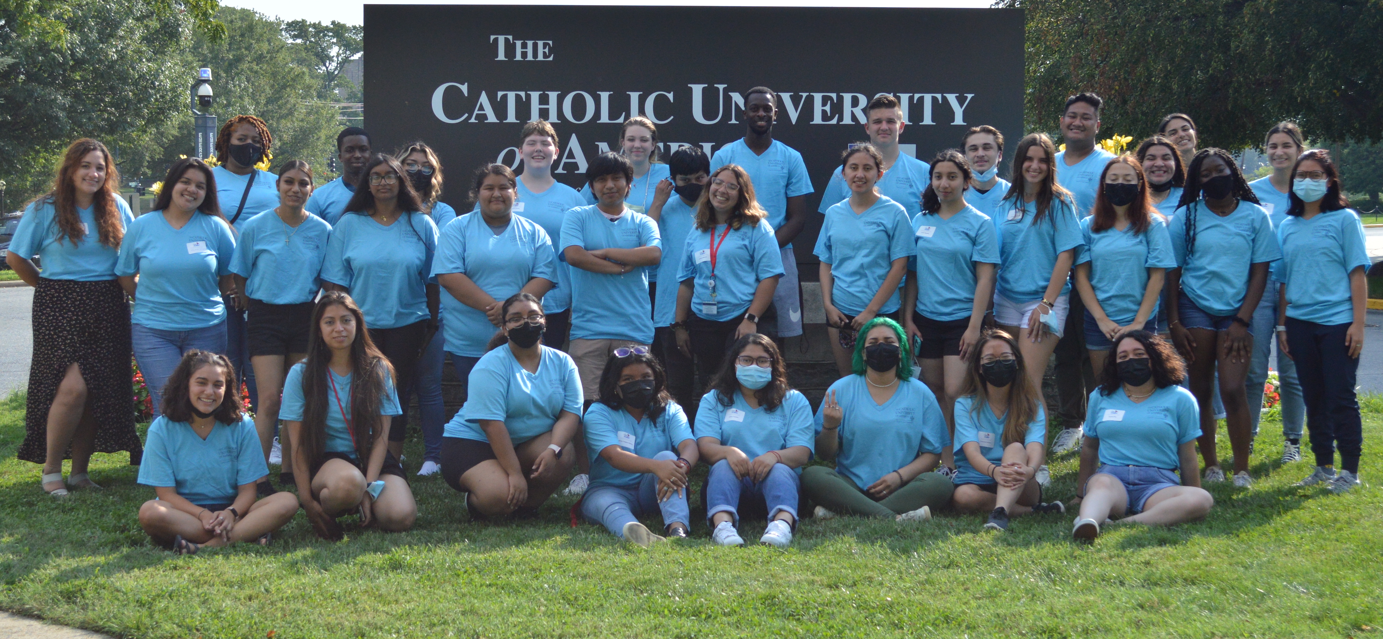 Group of students smiling during Take Flight orientation